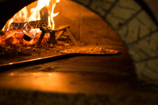istock Pizza cooking in a tradition oven 640154358
