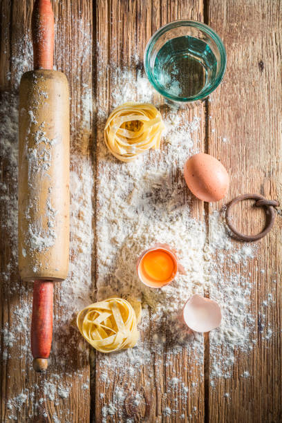 istock Ingredients for ingredients for pasta with eggs and flour 640154450