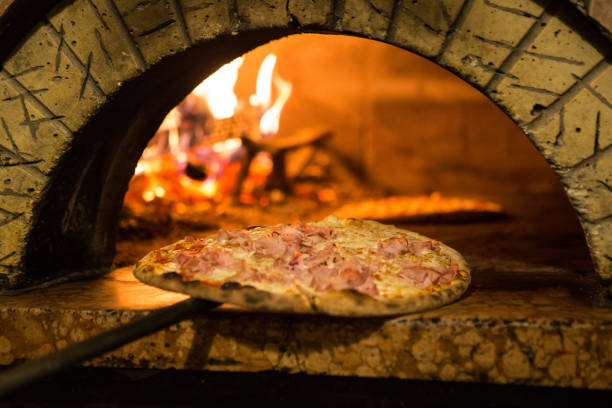 istock Pizza cooking in a tradition oven 640155668