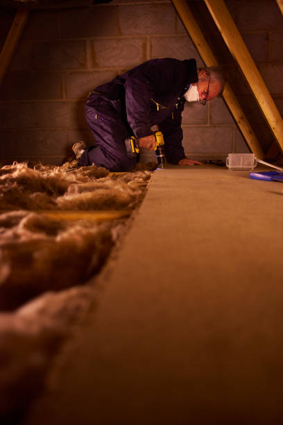 istock joiner laying attic floorboards 640156862