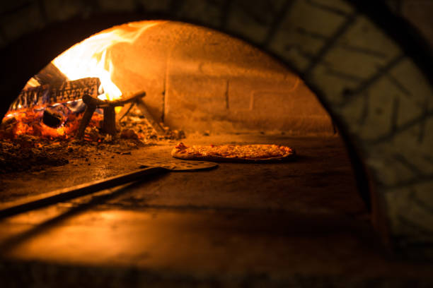istock Pizza cooking in a tradition oven 640156930