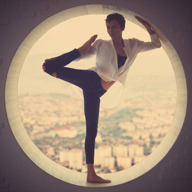 istock young woman doing yoga 640158068