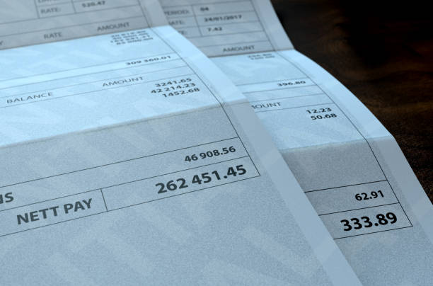 istock Income Inequality Paychecks 640160152