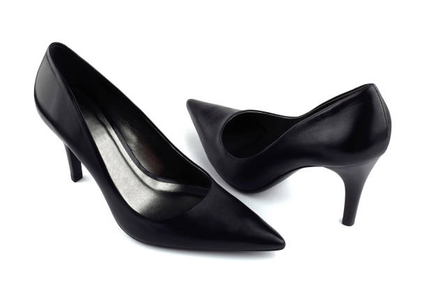 istock Black elegant women's shoes with high heels on white background 640162982