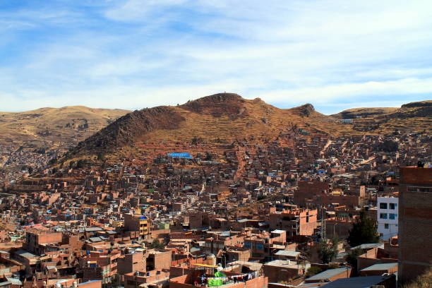 istock simple houses of puno with mountain panorama 640164520