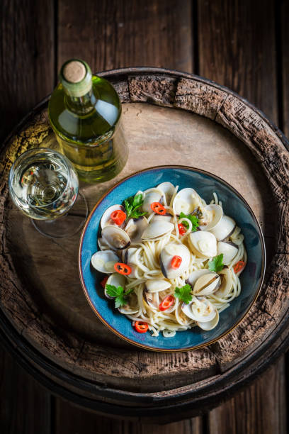 istock Delicious seafood pasta with clams, parsley and peppers 640165486