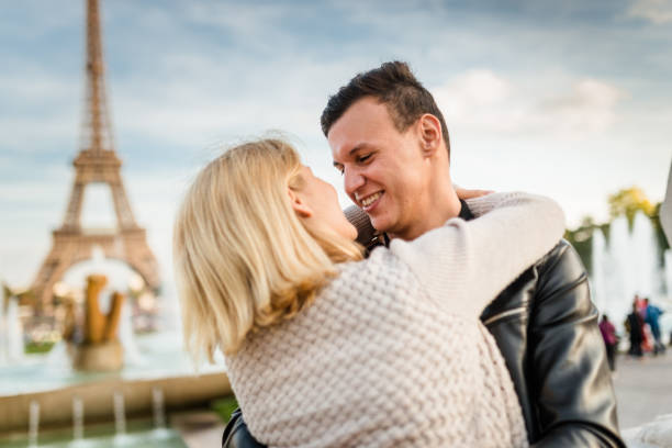 istock romantic couple enjoying the sunset on Paris 640165498