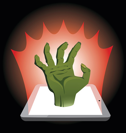 Zombie hand coming out of tablet.