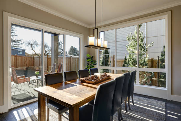 istock Sun filled dining room in new luxury home 640171690