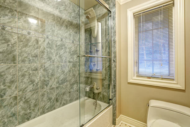istock Bathroom design with close up view of modern glass shower 640175252