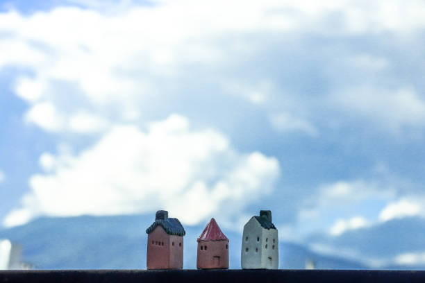Handcrafted clay pigeon houses are shown closely, revealing their artistic details. Captured in Turkey, these structures reflect local culture and art. The image represents craftsmanship and heritage.