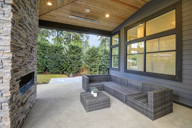 istock Chic patio design with vaulted ceiling and stone fireplace 640182298