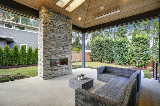 istock Chic patio design with vaulted ceiling and stone fireplace 640182422