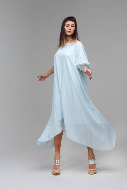 istock Nice woman pretending like she is flying 640184990