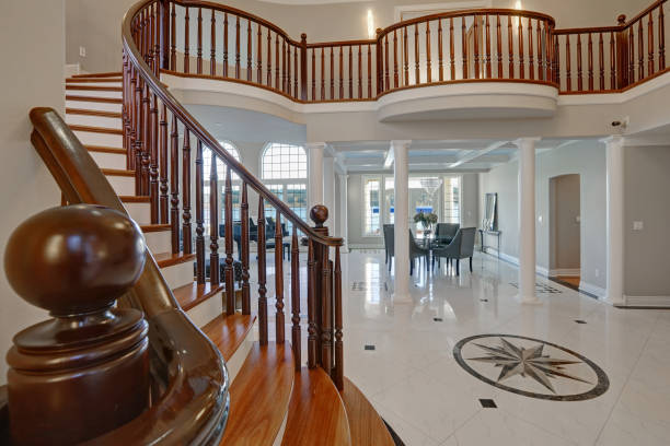 istock Stunning high ceiling entry foyer with marble mosaic tiled floor 640185520