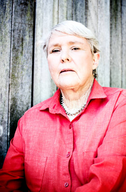 istock Serious silver-haired senior woman gives challenging stare 640185638