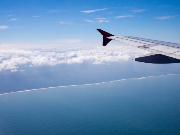istock Aircraft wing with bluesky from windows view. 640188386
