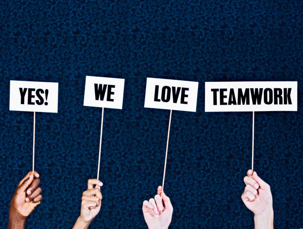 istock Hand-held signs say 
