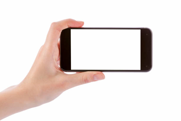 main tenant un téléphone intelligent noir isolé sur blanc - electronic organizer palmtop women personal data assistant photos et images de collection