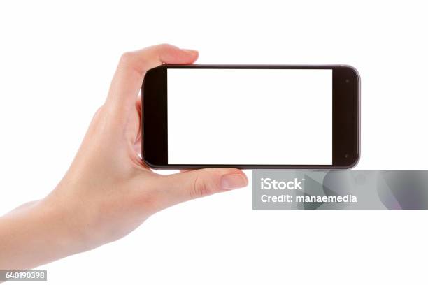 Hand Holding Black Smart Phone Isolated On White Stock Photo - Download Image Now - Horizontal, Telephone, Holding Hands