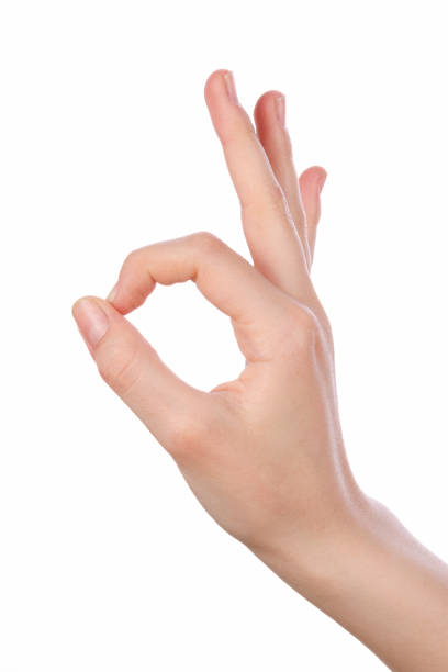 istock woman hand pointing up okay 640190818