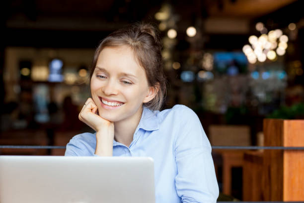 istock Pleased business lady looking at laptop screen 640191112
