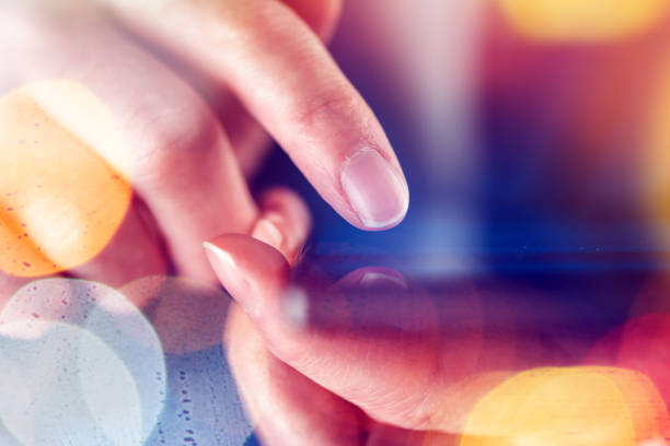 istock Female finger touching smart phone screen 640193184