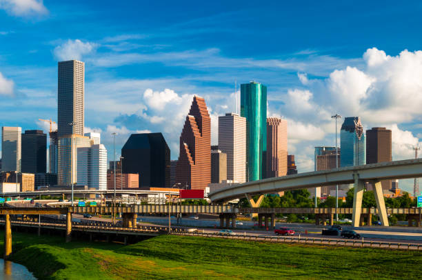 istock Houston Skyline with Beautiful Clouds and Highway 640193344