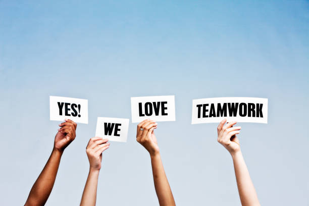 istock Hand-held signs say 