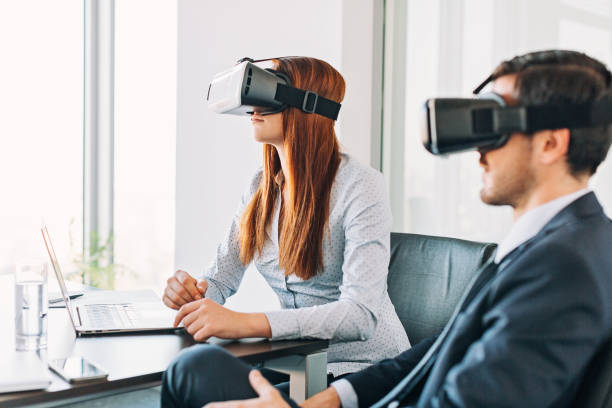 istock Business people with VR headsets 640196576