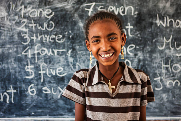 istock African little girl is learning English language 640197038