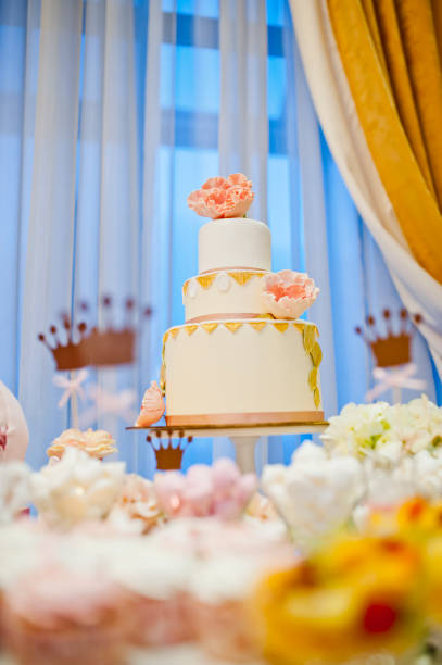 beautiful white big wedding cake with flowers stock photo