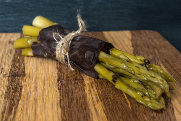 istock Organic grilled and marinated asparagus prepare for cooking 640200526