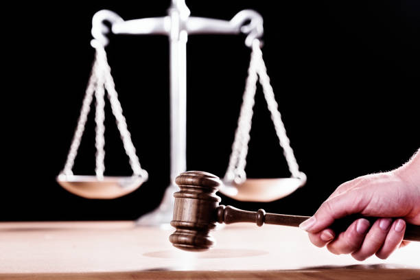 istock Hand bangs judge's gavel down, giving verdict and sentence 640200914