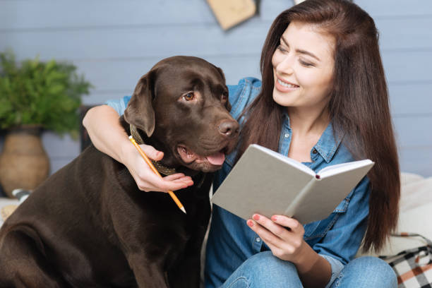 istock Cheerful young woman hugging her funny friend 640202016