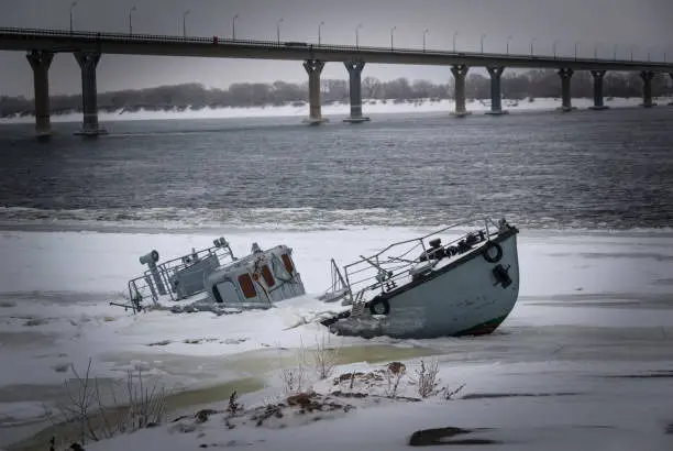 Photo of Sunken vessel in a frozen river