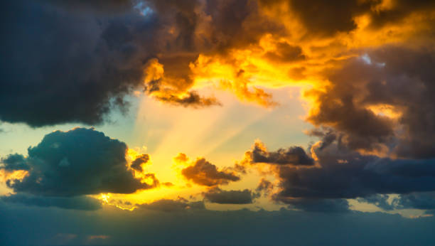 istock Dramatic sunset sky with yellow, blue and orange thunderstorm cl 640202526