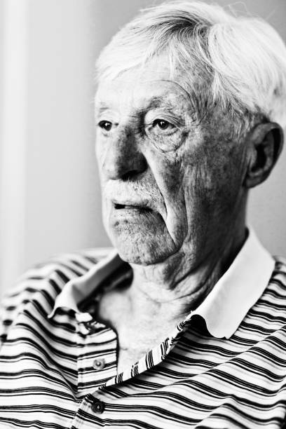 istock Handsome, but senile, old man looks vacantly at nothing 640203532