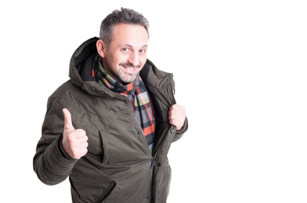 istock Male posing wearing winter jacket showing like gesture 640205490