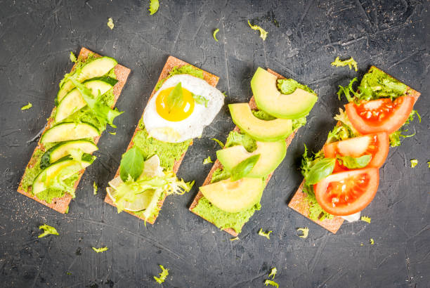 istock Diet sandwiches with guacamole and fresh vegetables 640205566