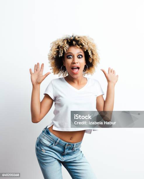 Surprised Afro American Young Woman Stock Photo - Download Image Now - Ecstatic, Excitement, Females