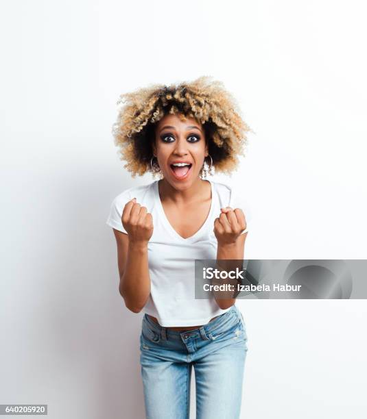 Excited Afro American Young Woman Stock Photo - Download Image Now - Adult, Adults Only, African Ethnicity
