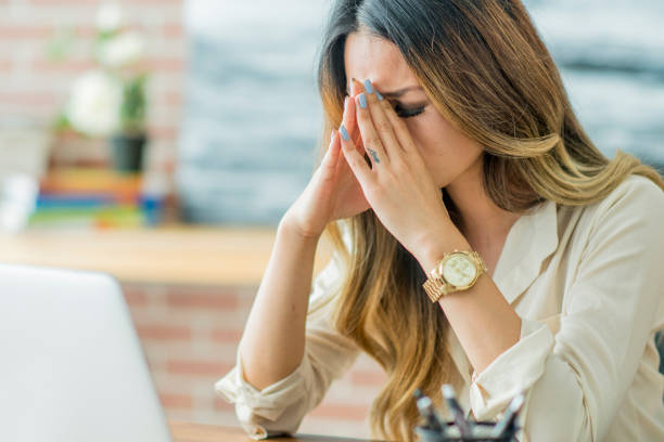 istock Businesswoman with a Migraine 640206046