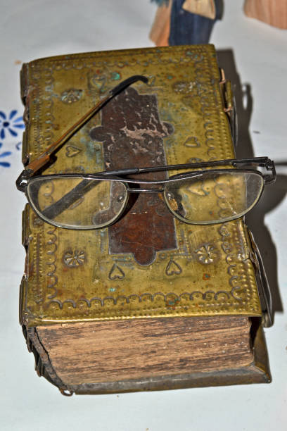 istock Old glasses on the Bible 4 640206246