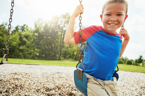 istock It’s simple - you hold on and swing high! 640209772