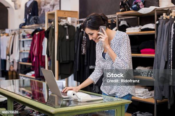 Entrepreneur Talking At Phone In Shop Stock Photo - Download Image Now - Small, Store, Business