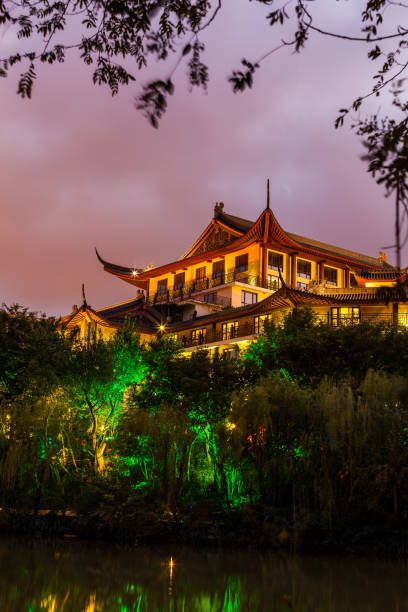 Wuhan, China – October 31, 2025: Geriatric medical center illuminated at night, highlighting smart technology and elderly care in China's city skyline.