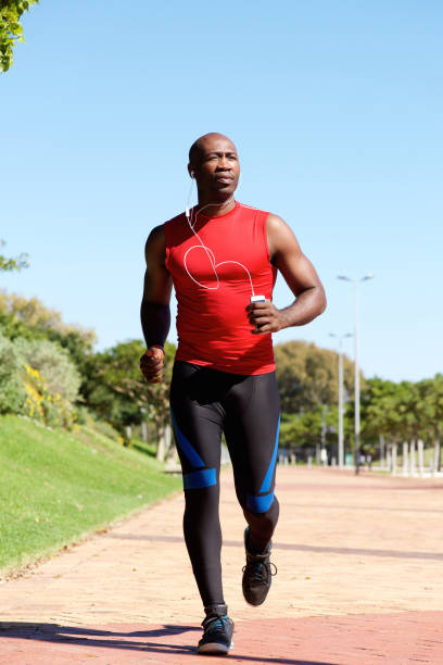 istock Fit african man running outdoors at the park 640212976