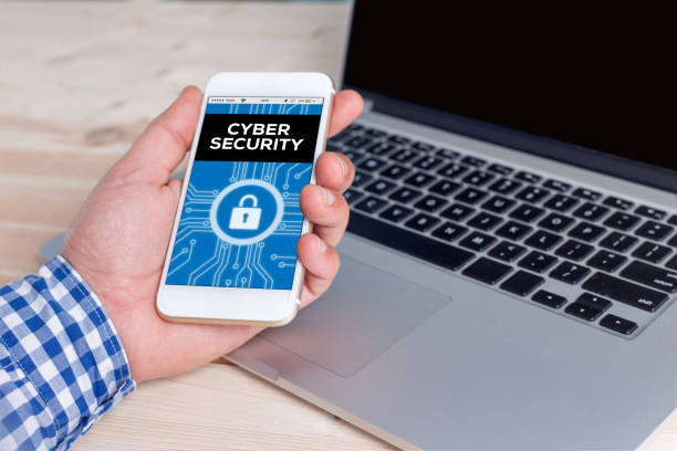istock Smartphone in hand and showing Cyber Security concept on screen 640213482