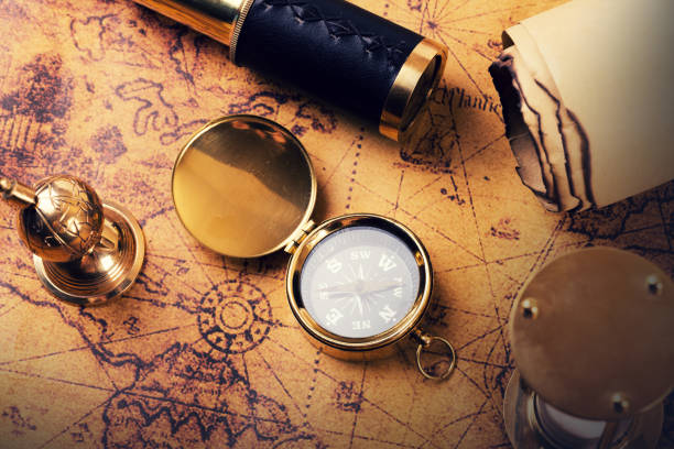 istock vintage compass and equipment on ancient treasure map 640214746